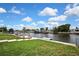 Manicured backyard overlooking the canal and waterfront neighborhood at 12637 2Nd Isle, Hudson, FL 34667