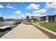 Waterfront home featuring a beautiful view and a brick-paved patio at 12637 2Nd Isle, Hudson, FL 34667