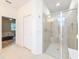 Bathroom with frameless shower, and tile surround at 13349 Niti Dr, Hudson, FL 34669