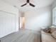 Bedroom featuring a sofa and a closet at 13349 Niti Dr, Hudson, FL 34669