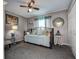 Charming bedroom with daybed, decorative pillows, and soft, natural light at 14011 Shoal Dr, Hudson, FL 34667