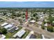 Overhead view captures a delightful home nestled in a serene, active community with well-maintained landscaping at 16037 Brookridge Blvd, Brooksville, FL 34613