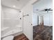 This bathroom has a stand-up shower and is tiled at 16037 Brookridge Blvd, Brooksville, FL 34613