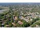 Aerial view showcasing the community's lush greenery and tranquil setting at 2139 Sea Pines Ct, Spring Hill, FL 34606