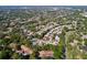 Aerial view showing the community's layout and mature trees at 2139 Sea Pines Ct, Spring Hill, FL 34606