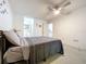 Bright bedroom with carpet, fan, and en suite bathroom at 2139 Sea Pines Ct, Spring Hill, FL 34606