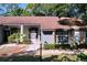 Charming single-story home with neutral paint, rock accents, and meticulous landscaping at 2139 Sea Pines Ct, Spring Hill, FL 34606