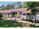 Charming single-story home with well-maintained landscaping and a welcoming entrance at 2139 Sea Pines Ct, Spring Hill, FL 34606