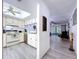A bright kitchen and an adjoining living room are presented in an inviting layout at 2139 Sea Pines Ct, Spring Hill, FL 34606