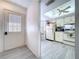 Bright kitchen featuring white cabinetry, modern appliances, and plenty of natural light at 2139 Sea Pines Ct, Spring Hill, FL 34606
