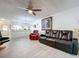 Inviting living room featuring modern flooring and an open-concept design at 2139 Sea Pines Ct, Spring Hill, FL 34606