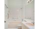 This bathroom features a tub, shower, and single sink vanity at 2348 Rolling View Dr, Spring Hill, FL 34606