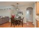 Cozy dining area with decorative lighting and vintage Coca-Cola machine at 2526 Brinley Dr, Trinity, FL 34655