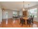 Open floor plan showcases the dining area and living room with hardwood floors at 2526 Brinley Dr, Trinity, FL 34655
