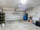Spacious garage with ample storage, including an extra freezer at 277 Hampshire Ave, Spring Hill, FL 34606