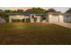 Charming single-story home with well-maintained lawn and a cozy, inviting entrance at 3427 Charmwood Ave, Spring Hill, FL 34609