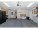 This garage has a washer/dryer, utility sink, and extra room for storage at 3609 Montclair Dr, New Port Richey, FL 34655