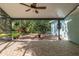 Enjoy the covered patio overlooking a serene backyard, perfect for outdoor living at 3609 Montclair Dr, New Port Richey, FL 34655
