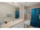 Well-lit bathroom with a bathtub, shower, and neutral color scheme at 3631 Celebration Dr, Brooksville, FL 34604