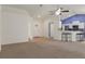 Bright living area with tiled entrance, barstool seating, and front entry at 3631 Celebration Dr, Brooksville, FL 34604