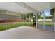Enjoy the outdoors bug-free in this screened porch, perfect for relaxing and entertaining at 3631 Celebration Dr, Brooksville, FL 34604