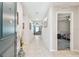Inviting foyer with tile flooring offers views into the living area and bedrooms, providing a glimpse of the home's layout at 3886 Reflection Dock Dr, Seffner, FL 33584