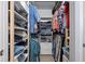 Walk-in closet with custom shelving, hanging rods, and ample storage space for clothes and accessories at 4009 Clear Spring Rd, Brooksville, FL 34604