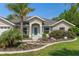 Attractive home exterior with a well-maintained lawn and inviting curb appeal at 4009 Clear Spring Rd, Brooksville, FL 34604
