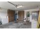 Functional garage featuring storage cabinets, utility connections, and entry door at 4009 Clear Spring Rd, Brooksville, FL 34604