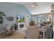 Spacious living room with vaulted ceilings, tiled floors, and views to the back yard from french doors at 4009 Clear Spring Rd, Brooksville, FL 34604