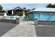 Well-maintained beach club bathrooms offering convenience and comfort by the shore, complete with outdoor seating at 4854 Marine Pkwy # 103, New Port Richey, FL 34652