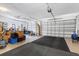 Spacious three-car garage with ample room for storage and vehicles at 487 Waterloo Ct, Spring Hill, FL 34609
