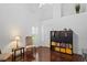 Bright room showcasing hardwood floors, storage, a window with plantation shutters, and vaulted ceilings at 4923 Fort Peck Rd, New Port Richey, FL 34655