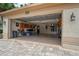 Spacious two-car garage with epoxy floors, built-in shelving, and ample storage space at 4923 Fort Peck Rd, New Port Richey, FL 34655
