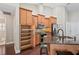 A gourmet kitchen with granite countertops, stainless steel appliances, and ample cabinet space at 4923 Fort Peck Rd, New Port Richey, FL 34655