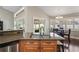The kitchen island bar features a stainless steel sink and stainless dishwasher at 4923 Fort Peck Rd, New Port Richey, FL 34655