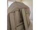 Living room covered in protective cloths with furniture being installed at 5111 Amulet Dr # 102, New Port Richey, FL 34652