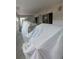 Living room during renovations, covered in protective plastic at 5111 Amulet Dr # 102, New Port Richey, FL 34652