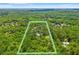 Aerial view of the property, showcasing its boundaries and lush green surroundings at 5363 Utopia Pl, Brooksville, FL 34601