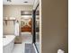 Modern bathroom design with soaking tub, glass shower and view to double vanity at 5363 Utopia Pl, Brooksville, FL 34601