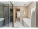 View of bath including tub and shower, showing access to dressing and bath area at 5363 Utopia Pl, Brooksville, FL 34601