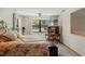 Comfortable bedroom with natural light, desk, and view of the outdoors at 5363 Utopia Pl, Brooksville, FL 34601