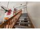 Staircase leading to an upper level overlooking an open-concept living space at 5363 Utopia Pl, Brooksville, FL 34601