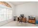 Office featuring a corner desk, a computer, and a bright window for natural light and ventilation at 5423 Abagail Dr, Spring Hill, FL 34608