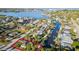 Waterfront home featuring canal access to the bay in a coastal community at 5447 Quist Dr, Port Richey, FL 34668