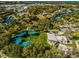 Scenic aerial view of the waterfront area in New Port Richey, featuring the park, waterways, and neighborhood at 5627 Ferguson Ct # 1303, New Port Richey, FL 34652
