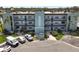 Three-story condominium with multiple balconies, mature landscaping, and convenient parking at 5627 Ferguson Ct # 1303, New Port Richey, FL 34652