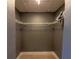 Organized walk-in closet offering ample storage with wire shelving and neutral paint at 6172 Raleigh St, Spring Hill, FL 34606
