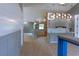 Modern kitchen with updated countertops, pendant lighting, and an open layout to other living spaces at 6172 Raleigh St, Spring Hill, FL 34606