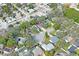 Aerial view of a residential neighborhood featuring mature trees and well-maintained homes at 6315 Shane Ln, New Port Richey, FL 34653